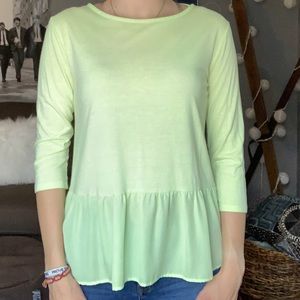 Stylus, yellow 3/4 sleeve shirt.